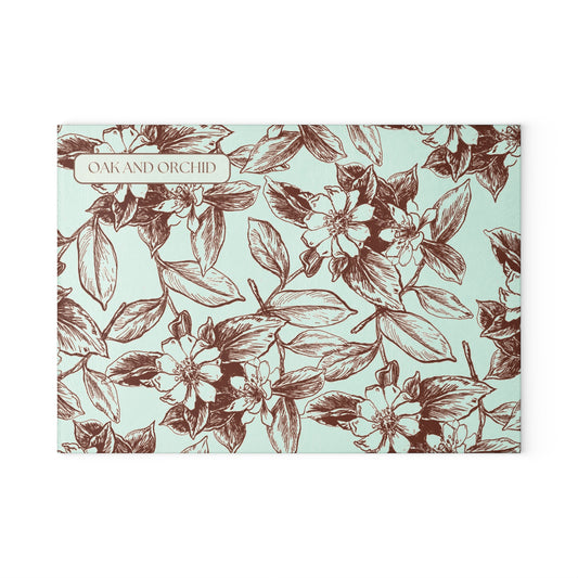 Ivory Ink - Elegant Floral Glass Cutting Board - Oak and Orchid Design